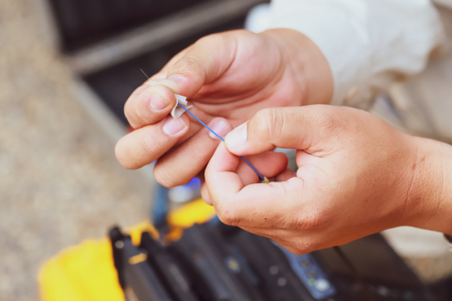 person holding fiber